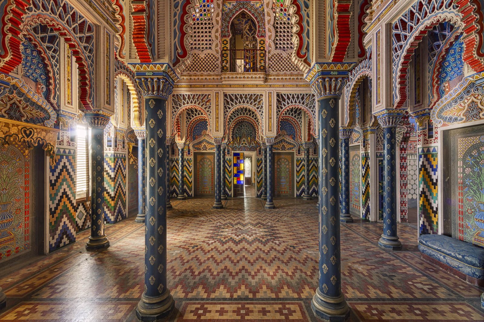 Moorish-style columned hall with a zigzag floor in Castello di Sammezzano, Tuscany, Italy
