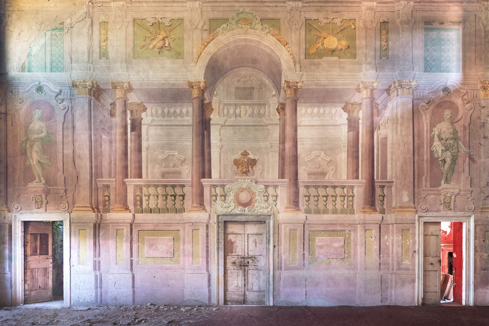 Illusionistically painted wall with fictive architecture in a rural villa in Lombardy, Italy