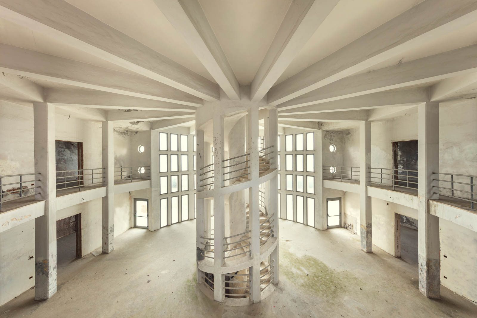 Round hall with a radiating ceiling structure in an abandoned holiday camp on the Adriatic coast, Italy