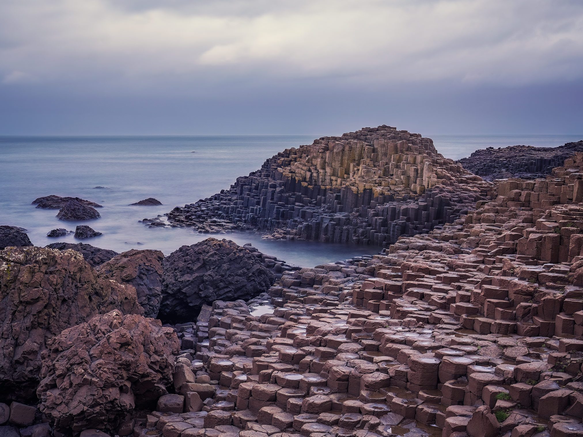 Basalt columns and boulders at dusk at the Giant's Causeway, Northern Ireland