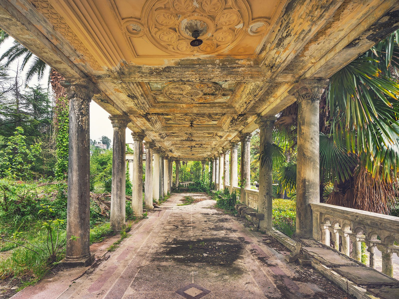 Ornate colonnade of a historic railway station on the Black Sea coast