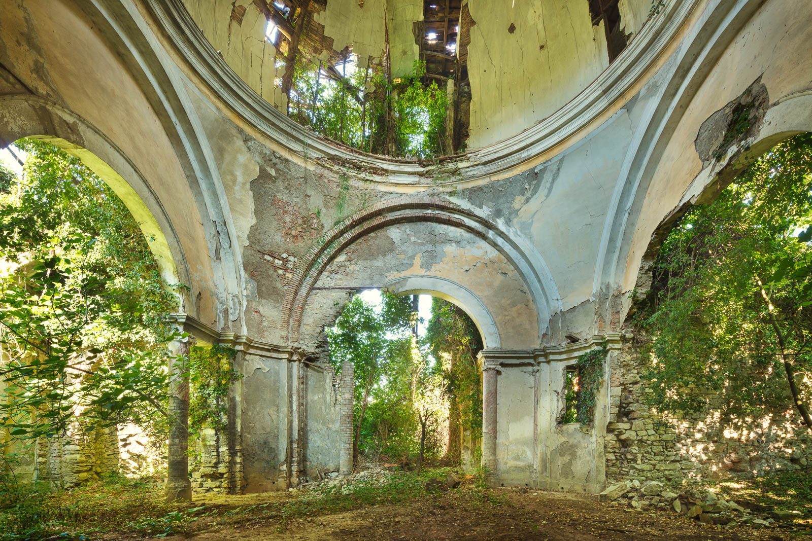 Abandoned chapel with a collapsed dome in Italy