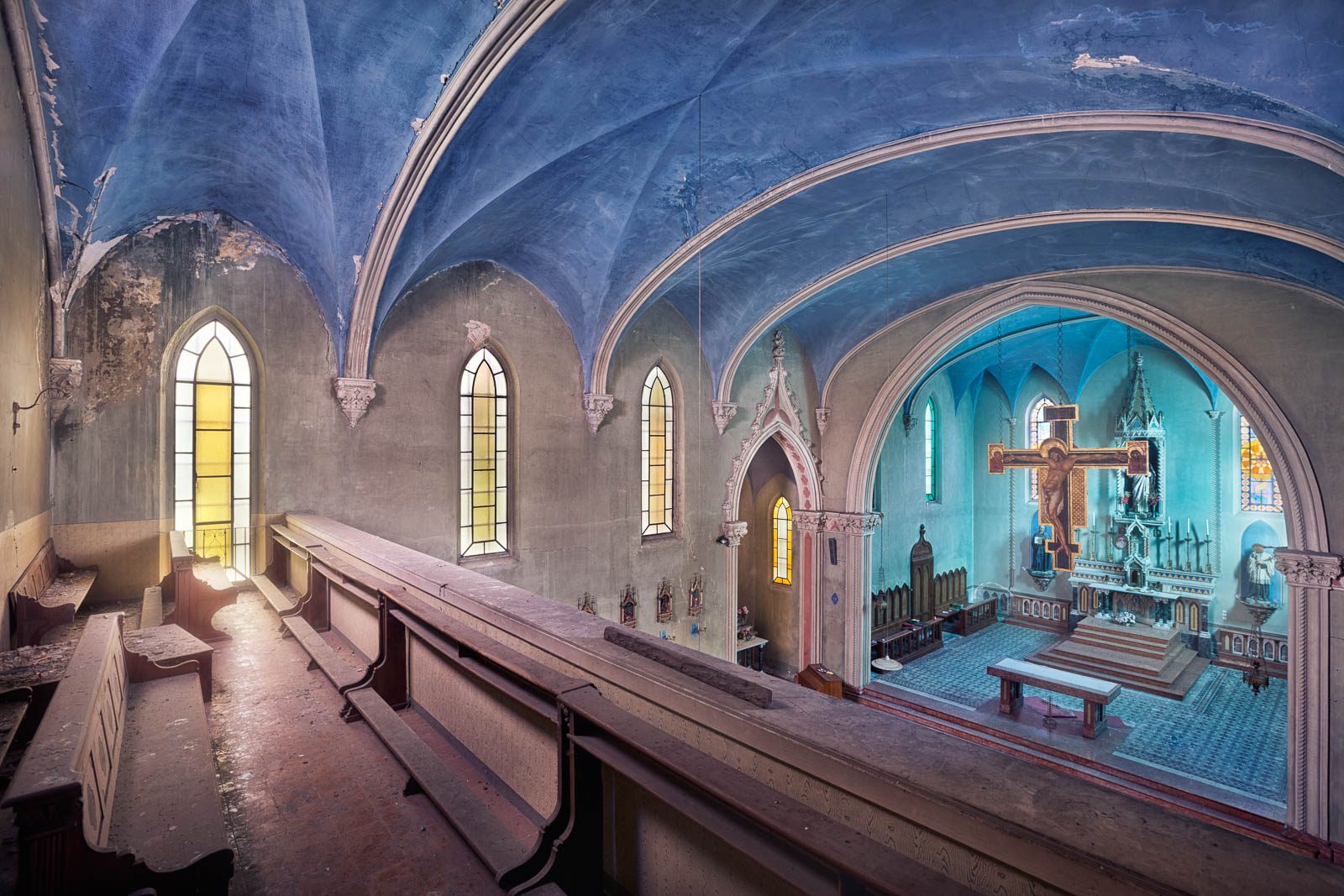 Abandoned church with pale blue vaulting in Italy
