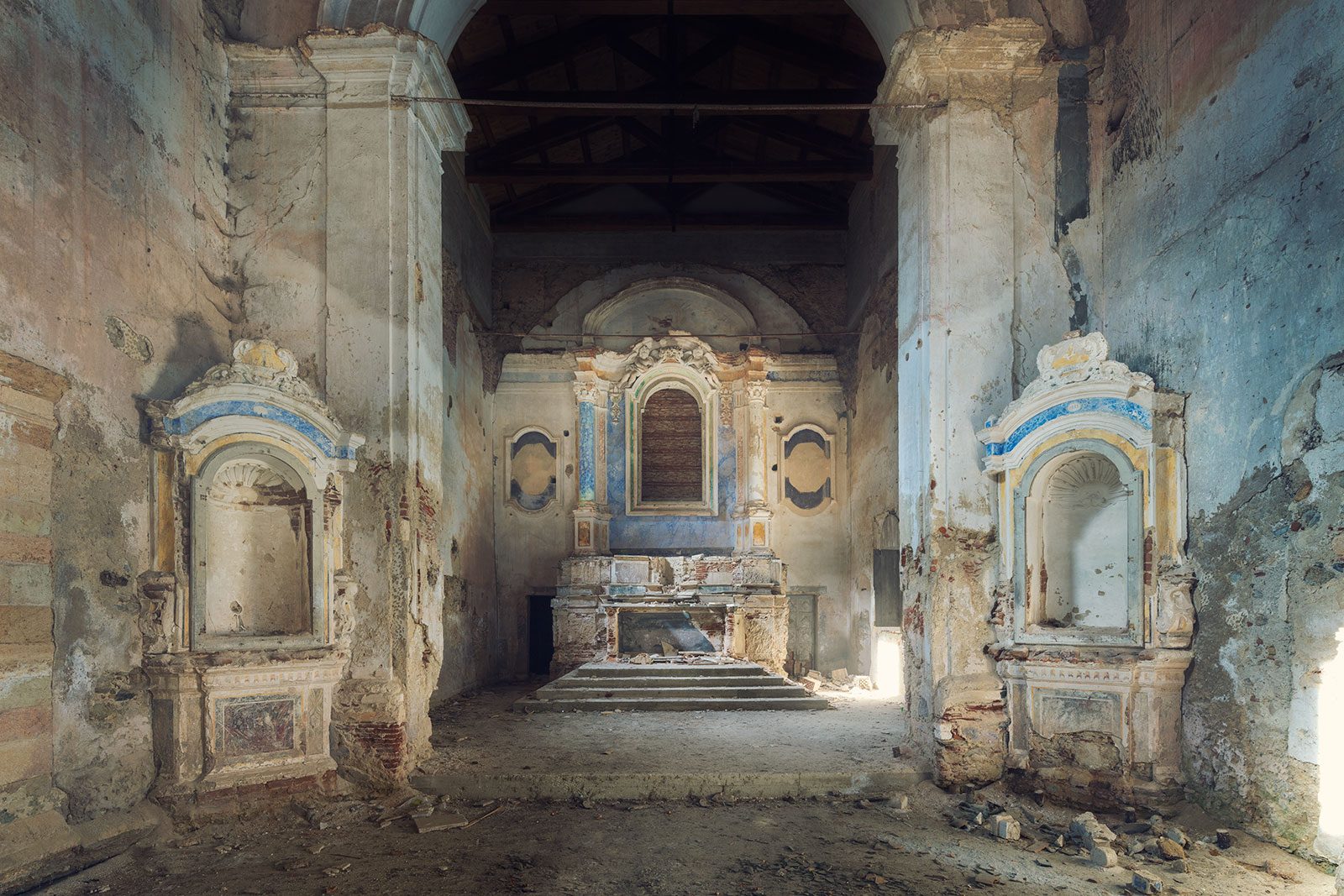 Abandoned monastery with symmetrical wall niches in Italy