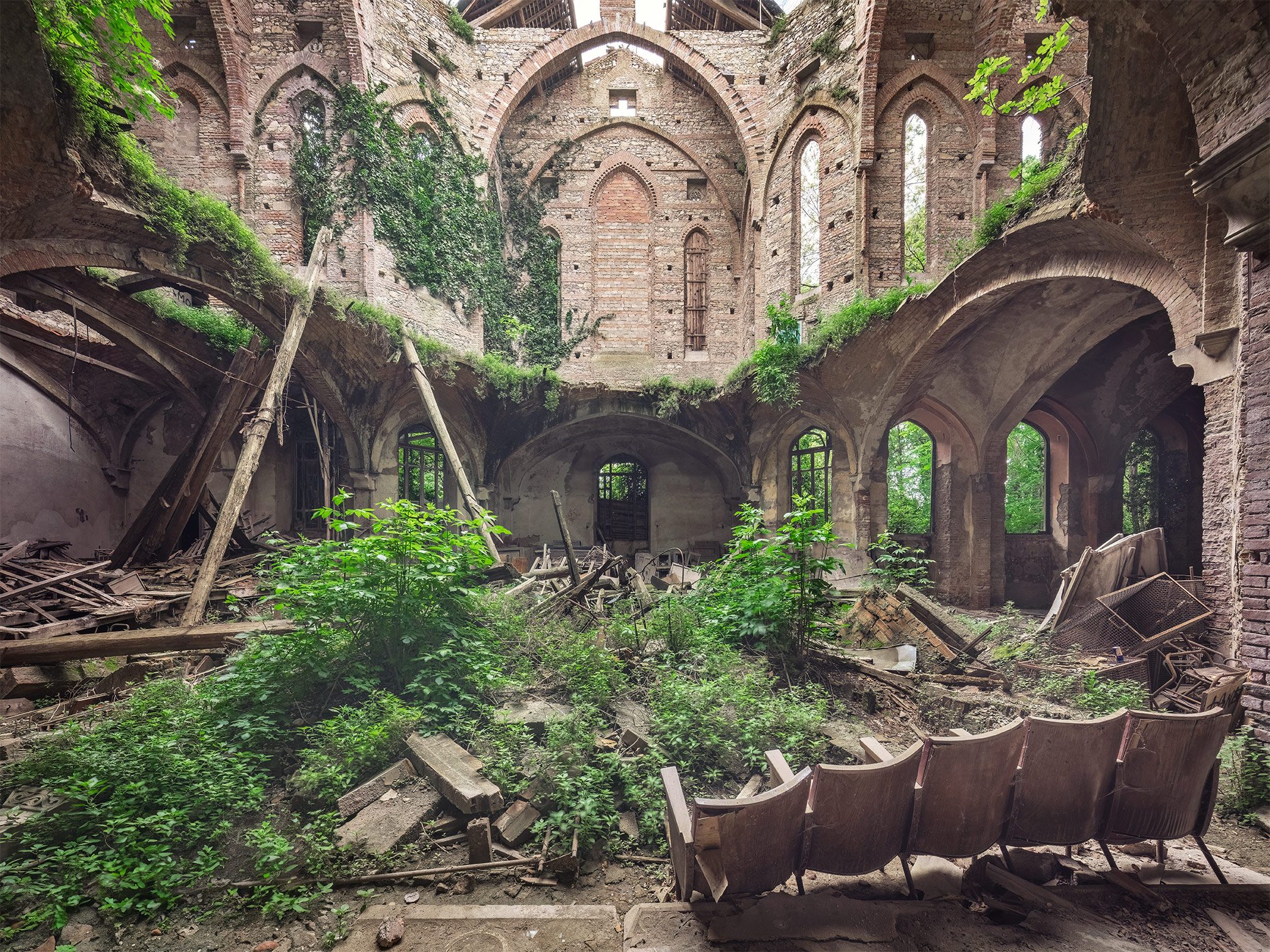 Collapsed church with old rows of seating in Italy