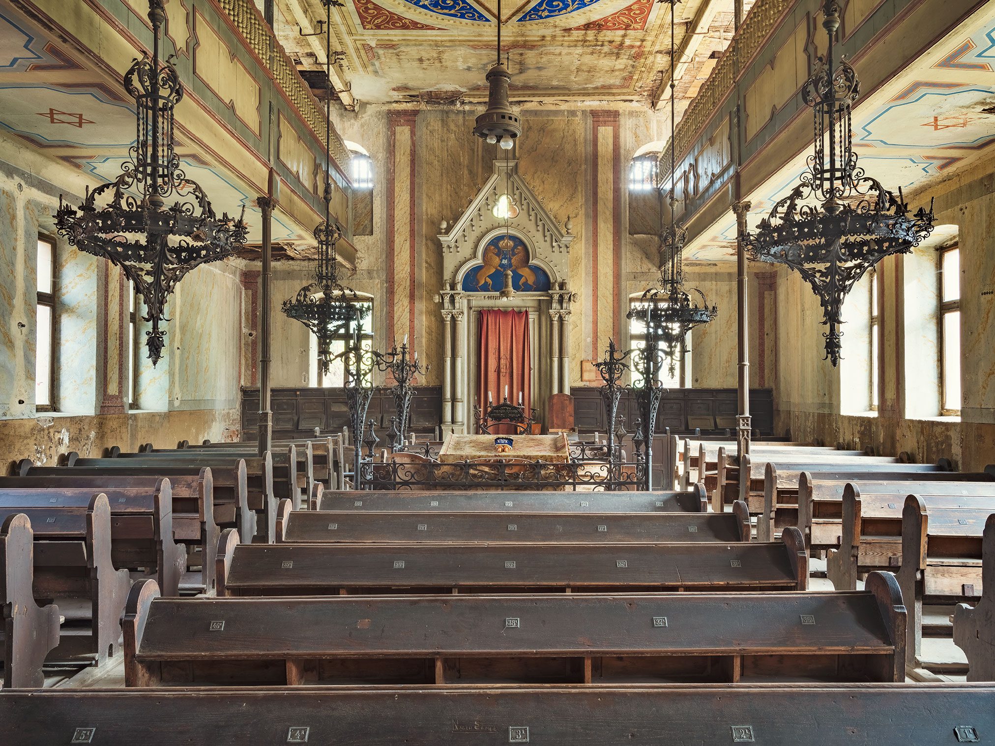 Abandoned synagogue with painted ceiling and Torah ark in Romania
