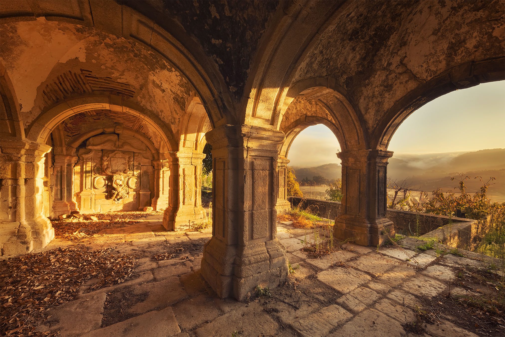 Vaulted cloister loggia overlooking the hills of the Douro valley, Portugal