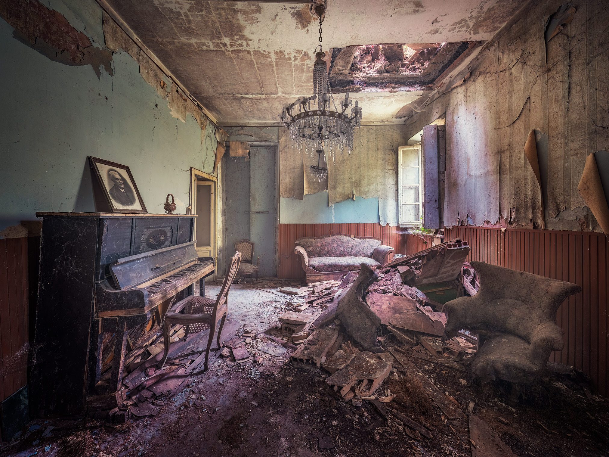 Collapsed living room with a piano in an old villa in Italy