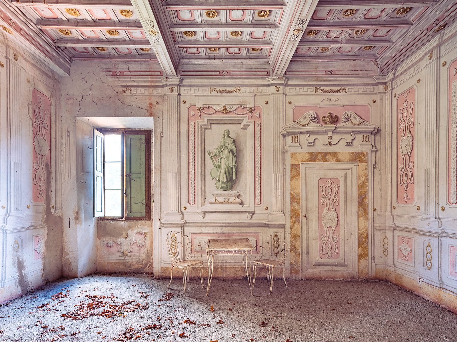 Stucco relief with a female figure in an abandoned villa in Tuscany