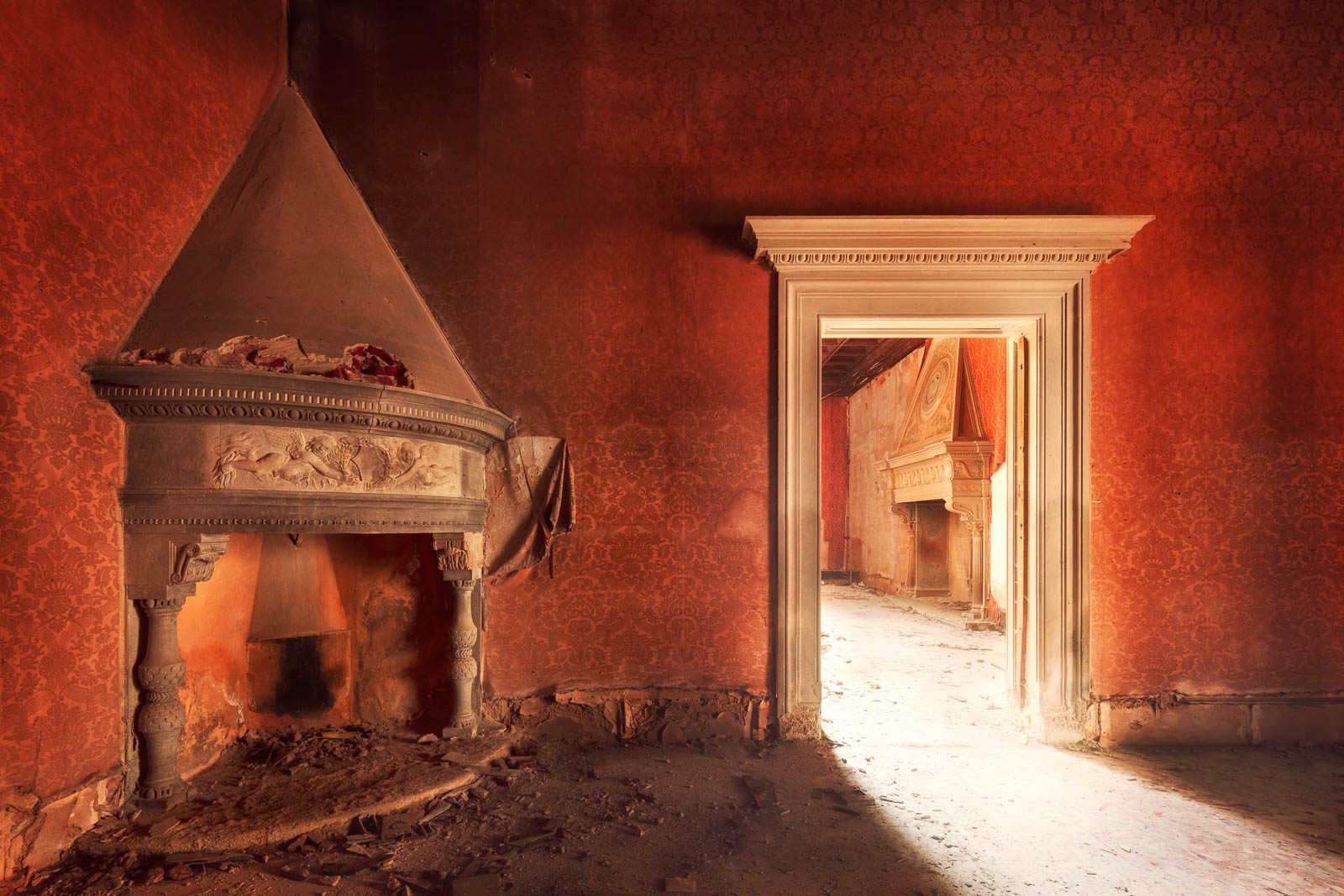 Fireplace room with a stone hood in an abandoned castello in Tuscany