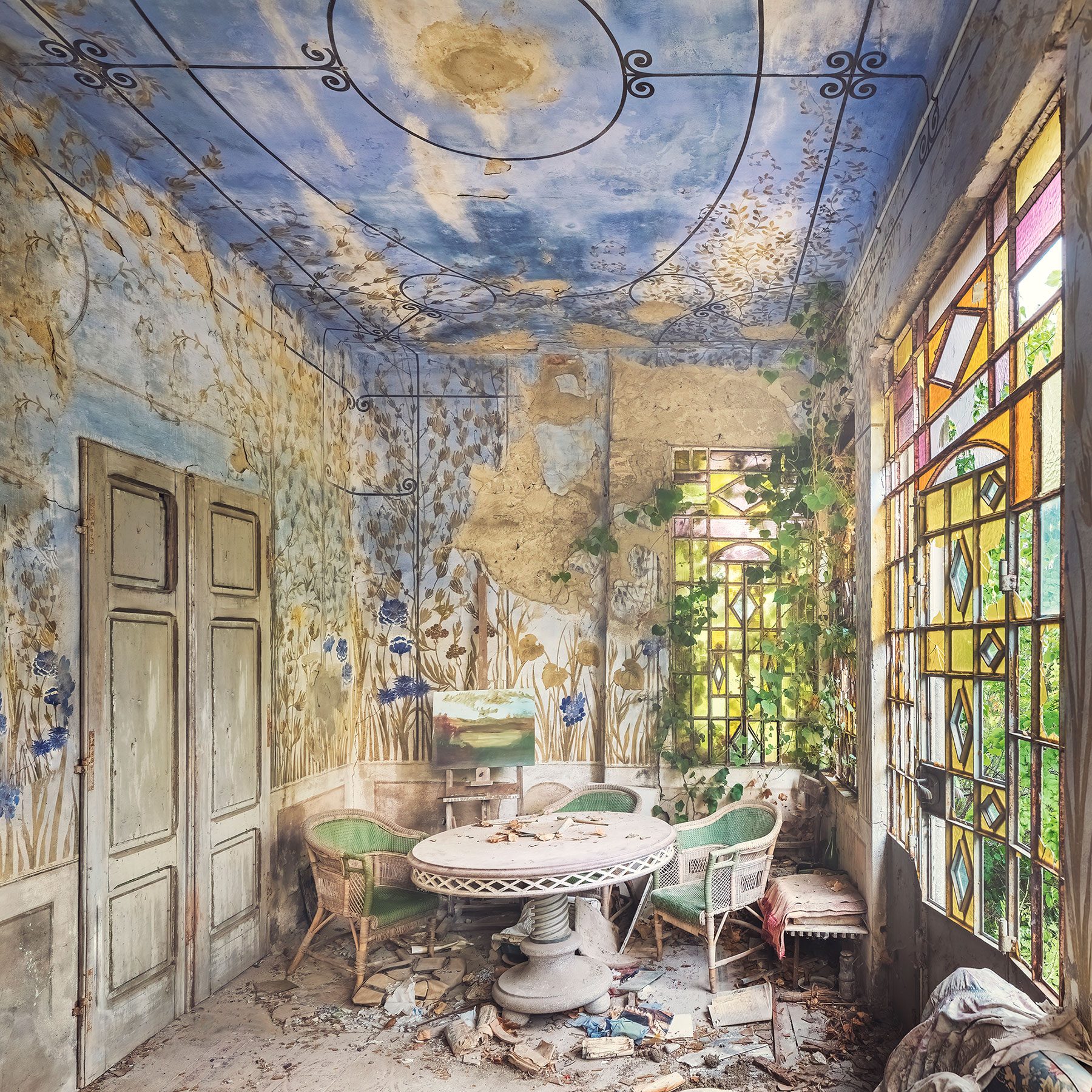 Conservatory with a painted sky ceiling in an abandoned villa in Italy