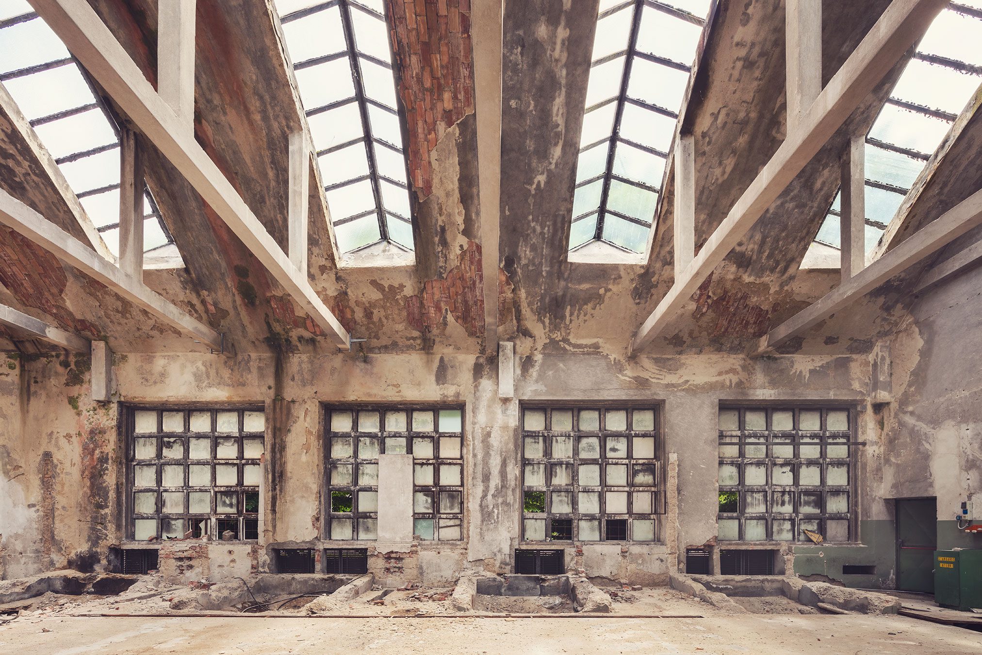 Sawtooth roof with glazed sections above an abandoned factory in northern Italy