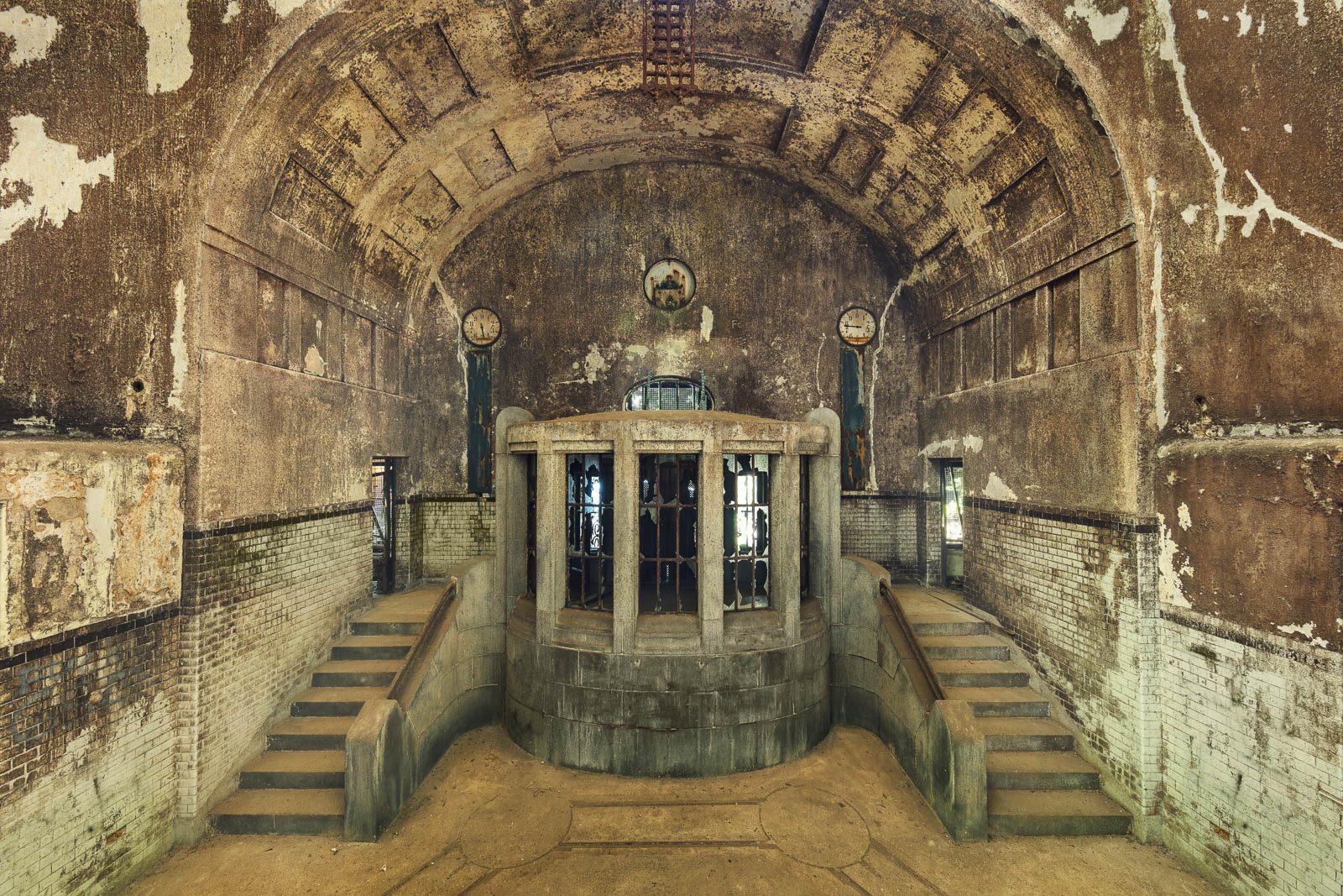 Round structure with two clocks in a historic water treatment plant in Germany