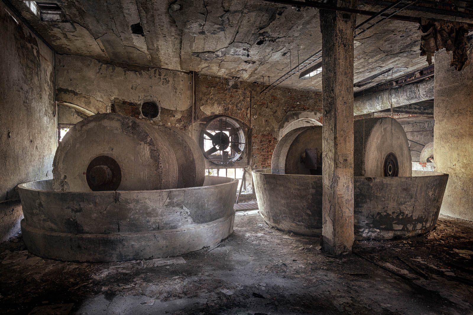 Round vats in a former paper factory in Italy