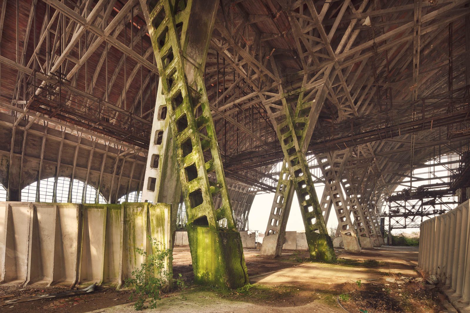 Folded roof structure of an industrial ruin in Veneto, now used as a car park