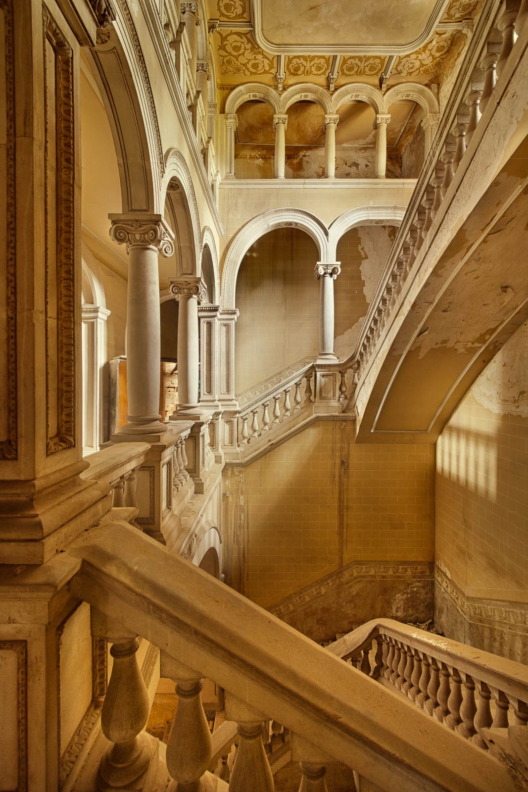 Staircase with columned galleries in a factory owner's palace in Spain
