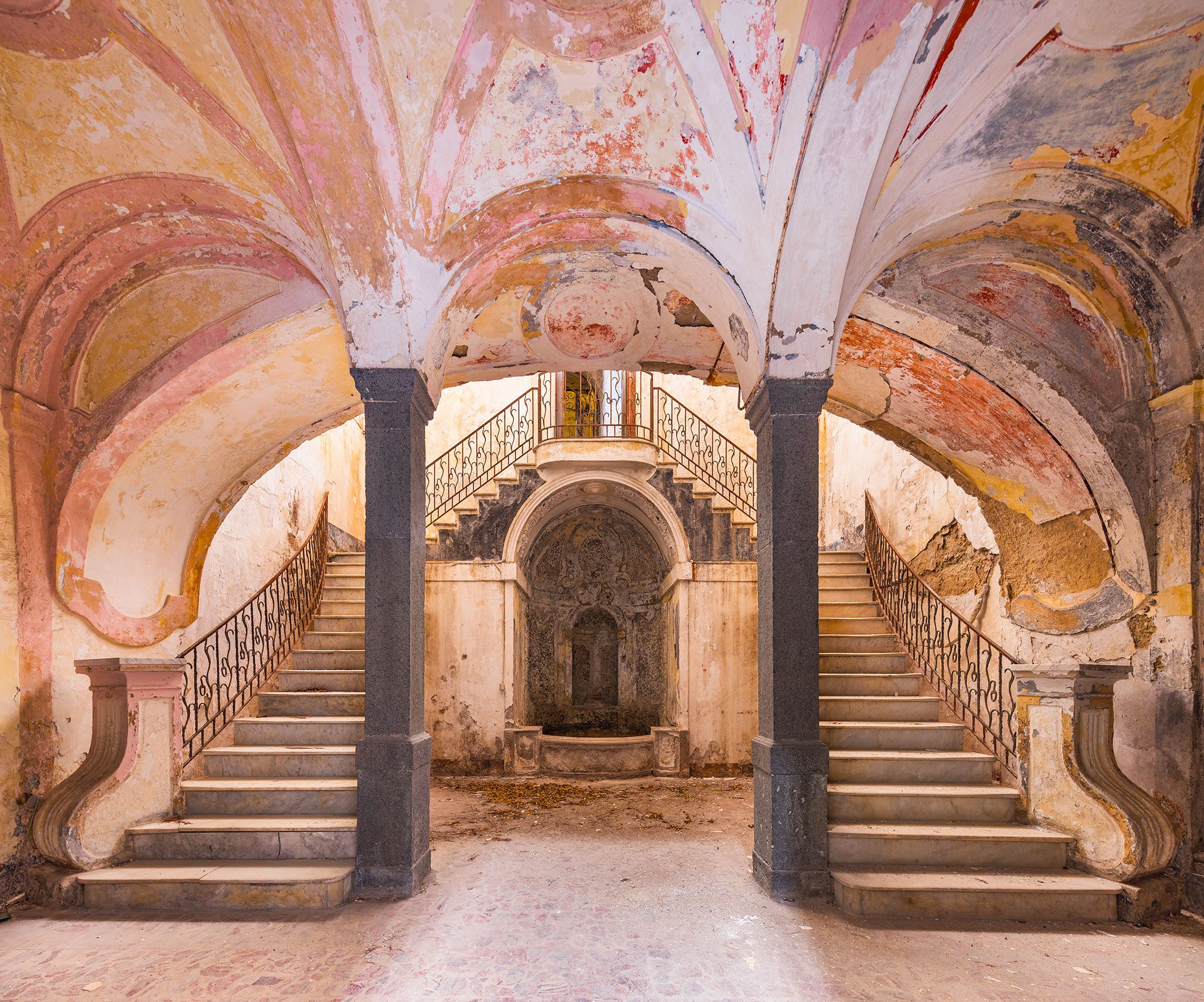 Palace with a symmetrical double staircase and ceiling fresco in Italy
