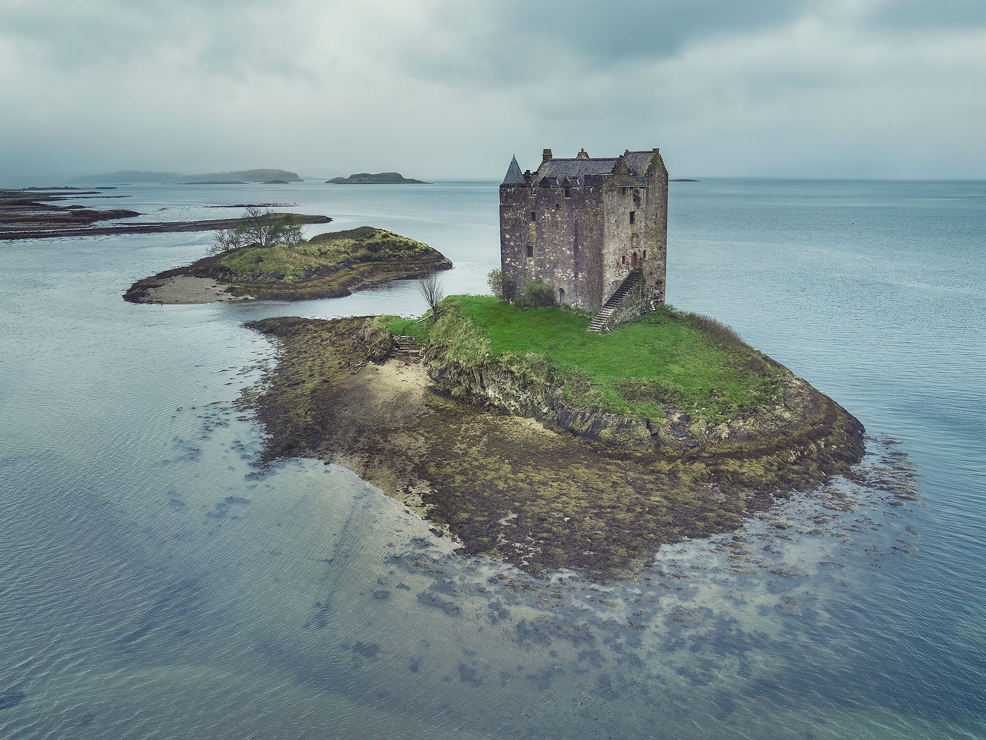 Tower house on a small tidal islet, Scotland