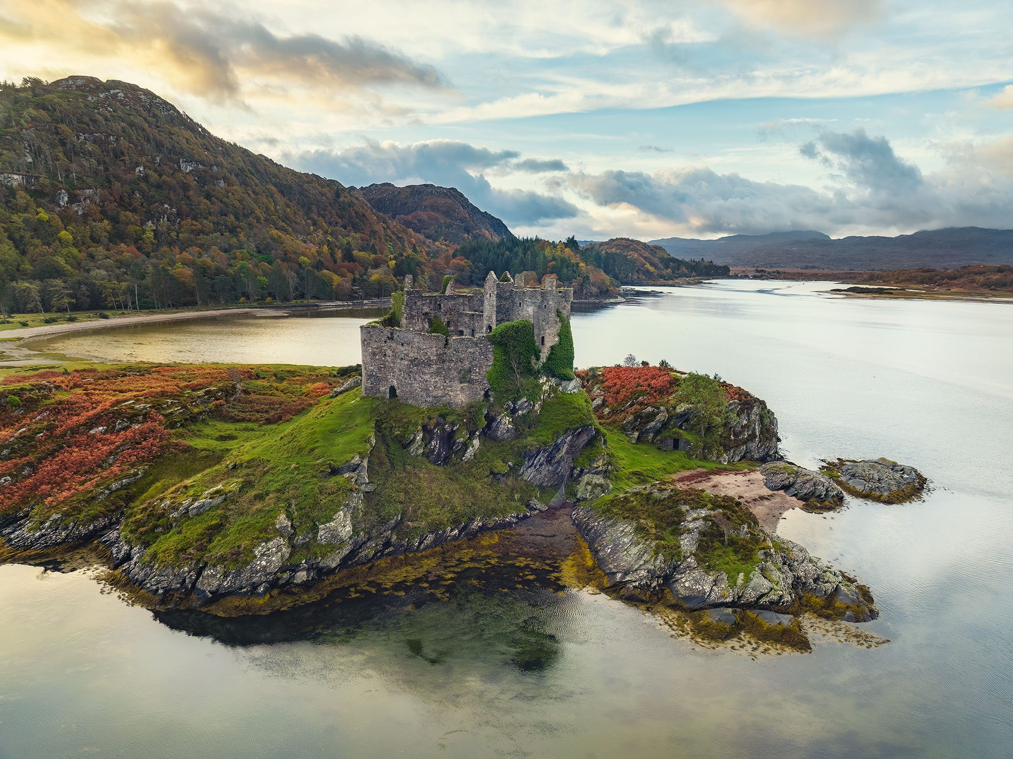 Castle ruin on a tidal island at low tide, Scotland
